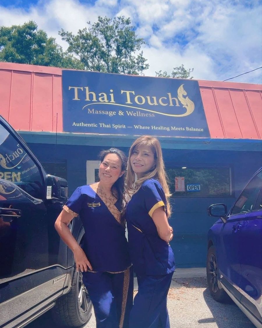 The Thai Touch Massage and Wellness storefront in Gulf Breeze with the team outside